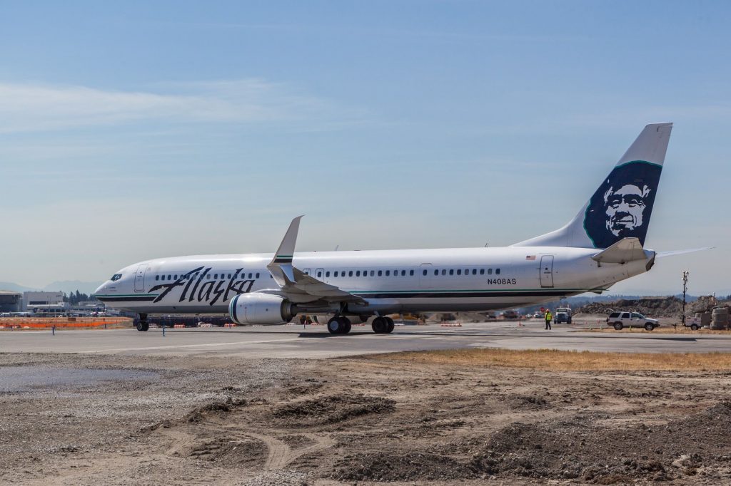 Alaska Airlines Boeing 737-900 crossing the center runway.