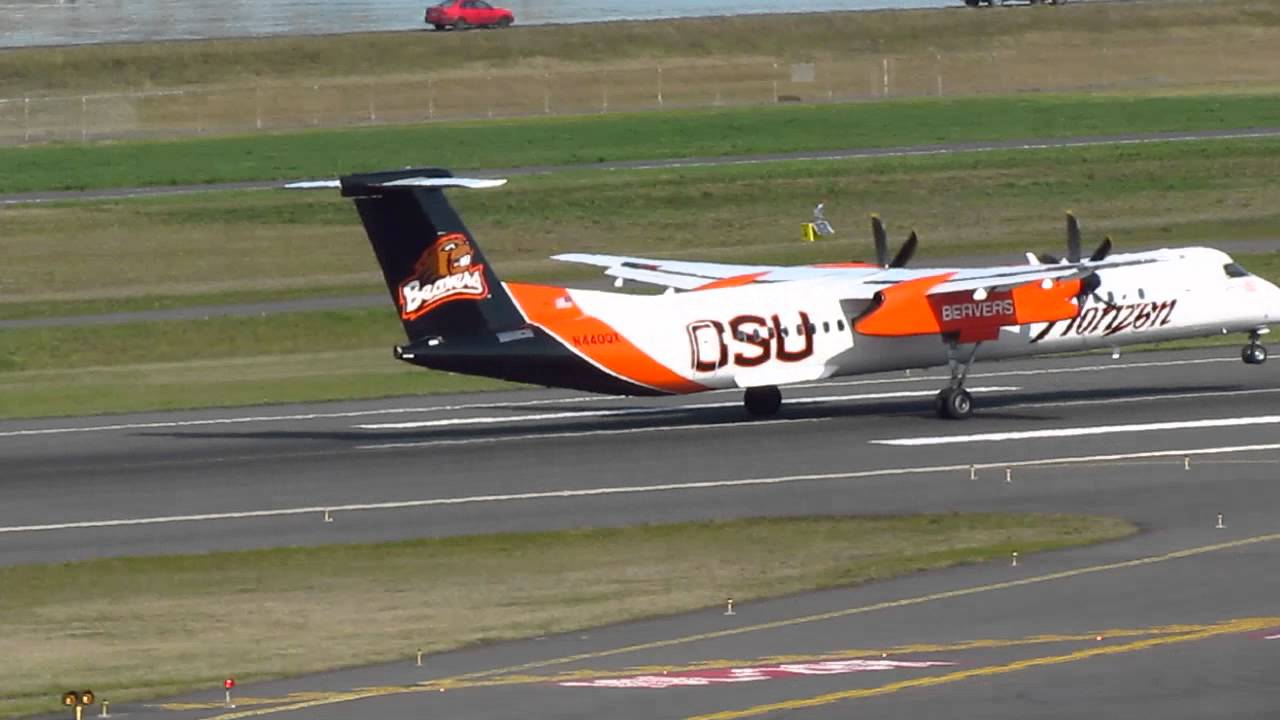 Alaska Horizon Air Bombardier Q400 With The OSU Beavers Paint Job Takes Off From KPDX On Runway 10L