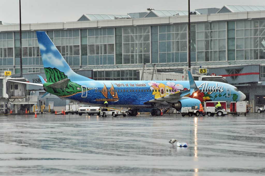 passenger boarding process on Alaska Airlines Boeing 737-800 Spirit of The Islands Aircraft