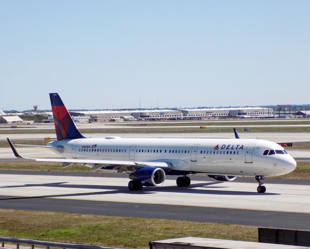 Delta Air Lines Fleet Airbus A321-200 N301DV taxies for departure, flying to San Diego