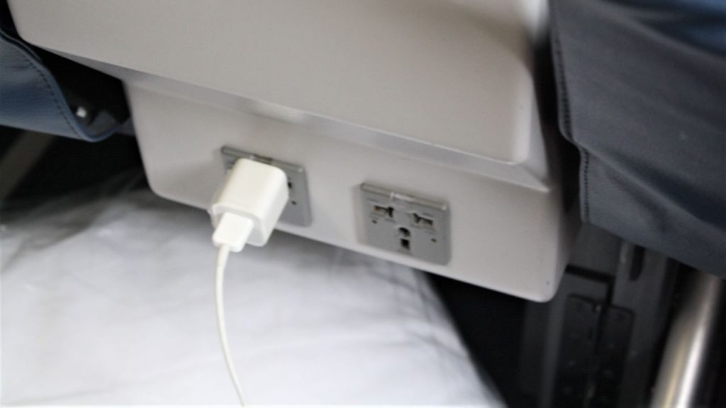 Delta Air Lines Boeing 757-200 Premium Economy (Comfort+) Class universal power port below the seat in front as well as a USB port by the IFE Photos