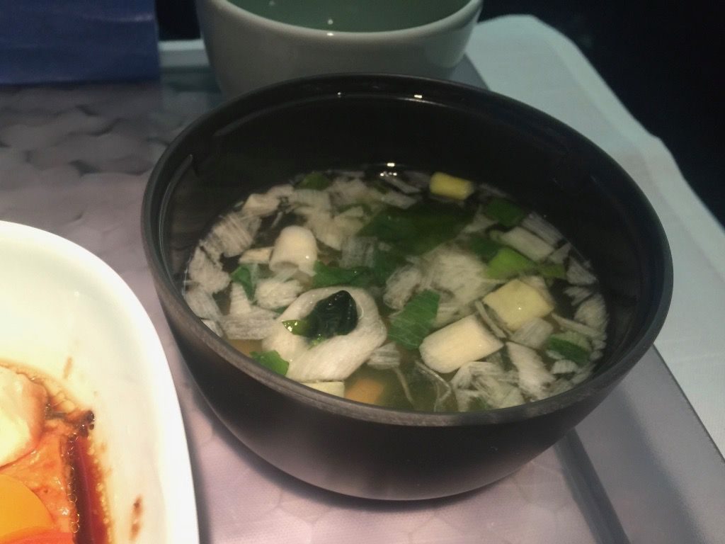 Delta Air Lines Fleet Boeing 777-200ER Business Elite Class (DELTA ONE) inflight food services main dish miso soup