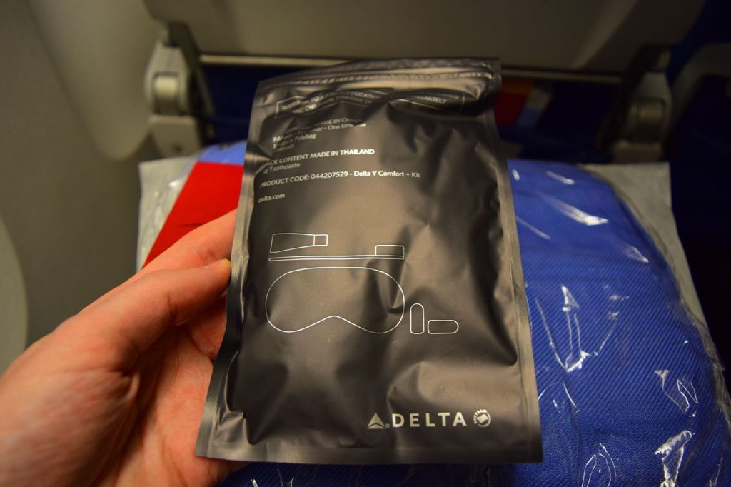 Delta Air Lines Fleet Boeing 777-200ER Premium Economy (Comfort+) comfort kit contains eye mask, earplugs, and toothbrush