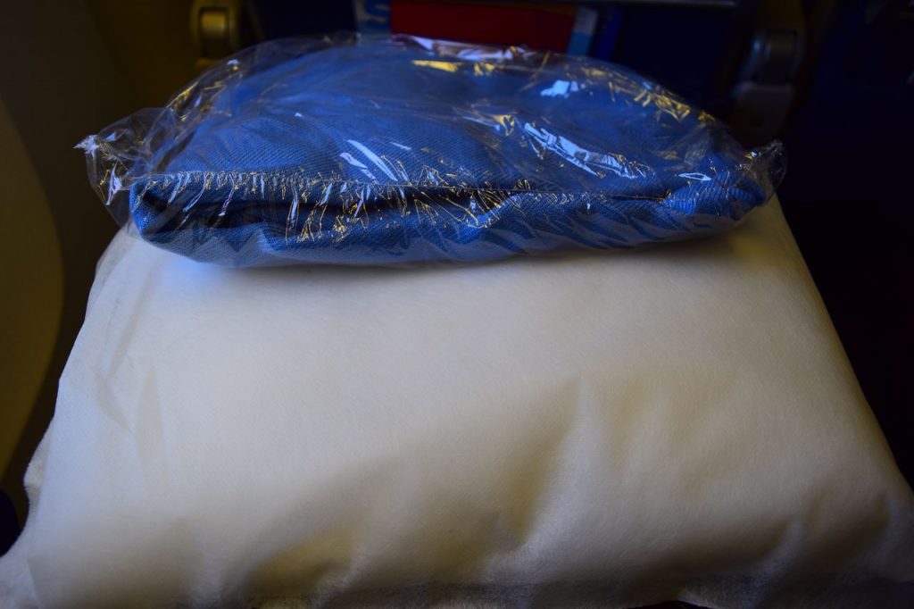 Delta Air Lines Fleet Boeing 777-200ER Premium Economy (Comfort+) standard pillow and blanket photos