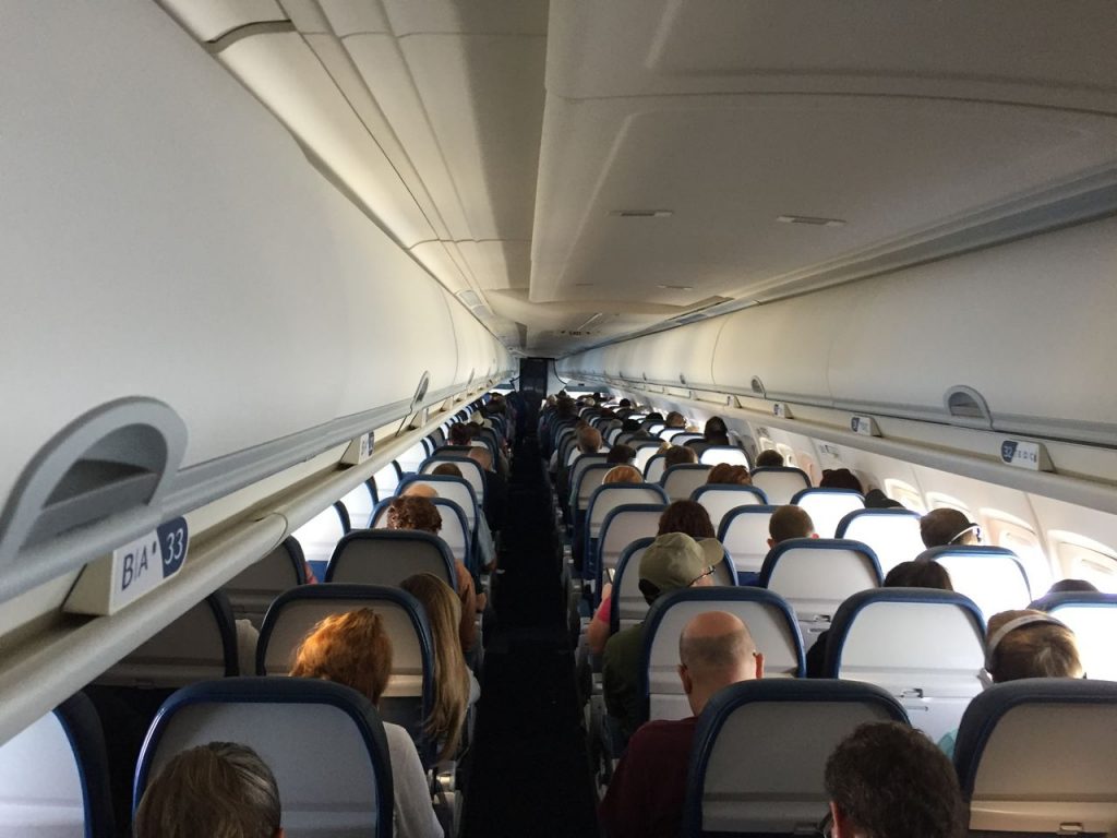 Delta Air Lines Fleet McDonnell Douglas MD-90-30 (M90) Economy Class Cabin During Flight Photos