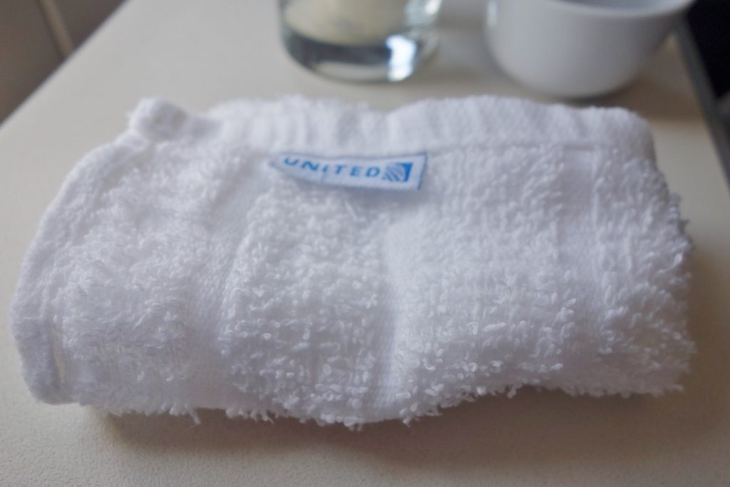 United Airlines Fleet Airbus A320-200 Business Class:Domestic First:United First inflight amenities hot towel services