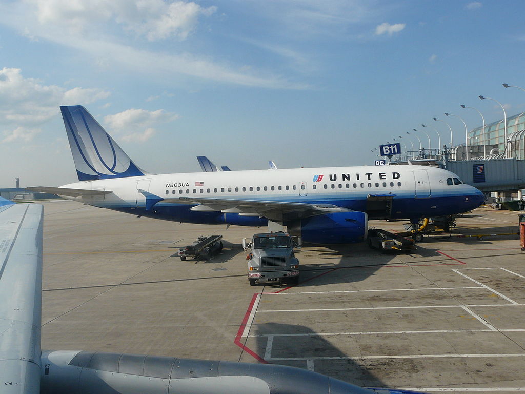 United Airlines Fleet N803UA Airbus A319-100 on boarding gate at O'Hare International Airport