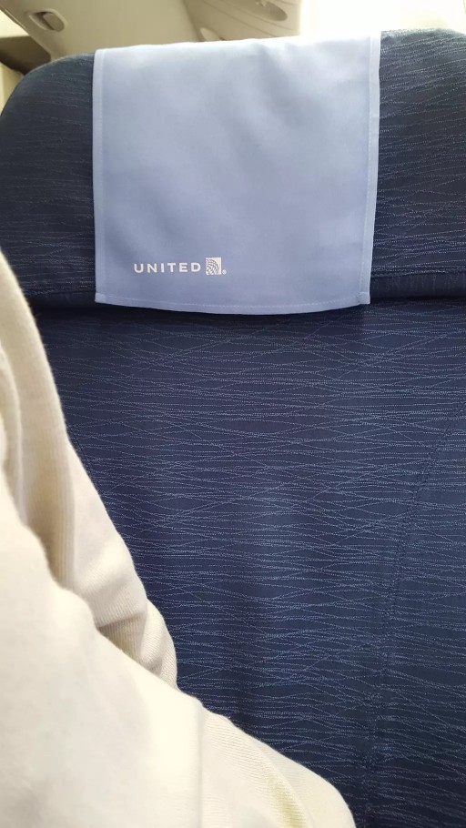 United Airlines Widebody Aircraft Boeing 777 200ER Economy Class Cabin Standard Seats Head rest