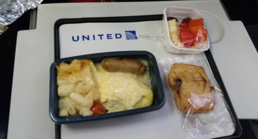 United Airlines Widebody Aircraft Boeing 777 200ER Economy Class Cabin meal choices omelette and sausages with pasta