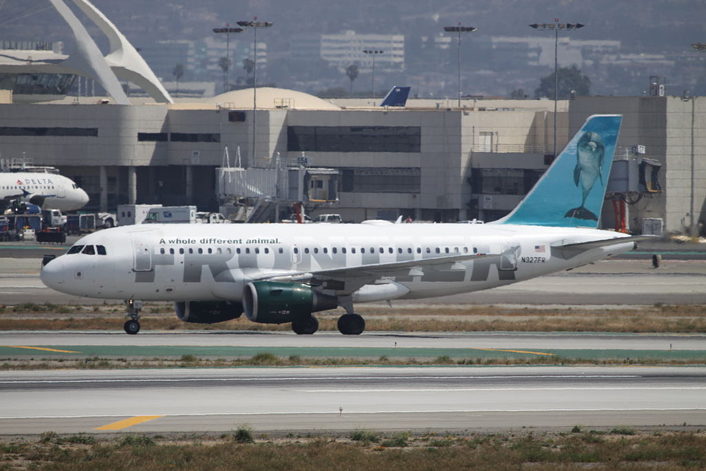 Airbus A319 111 Frontier Airlines Flip the Bottlenose Dolphin N927FR taxiing at LAX Airport
