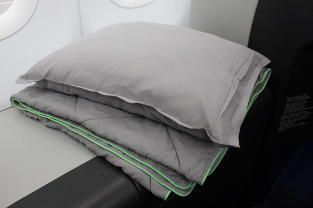 Airbus A321 200 JetBlue Airways Mint Suite Experience Business Class Cabin inflight bedding pillow and blanket very plush and comfortable