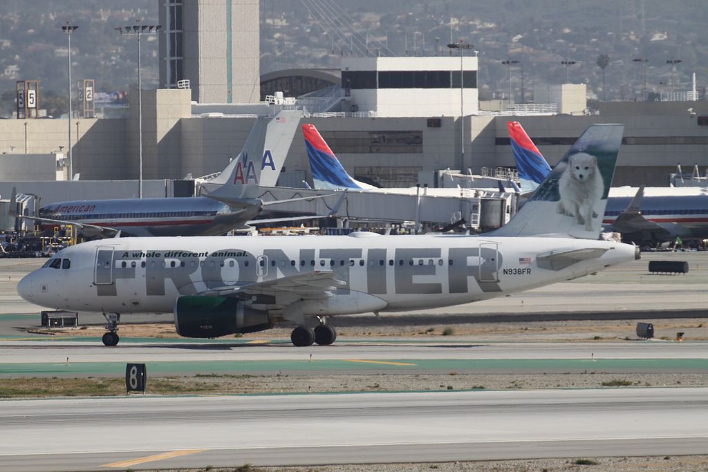 Frontier Airlines Airbus A319 111 N938FR Misty the Arctic Fox lining up on runway at LAX