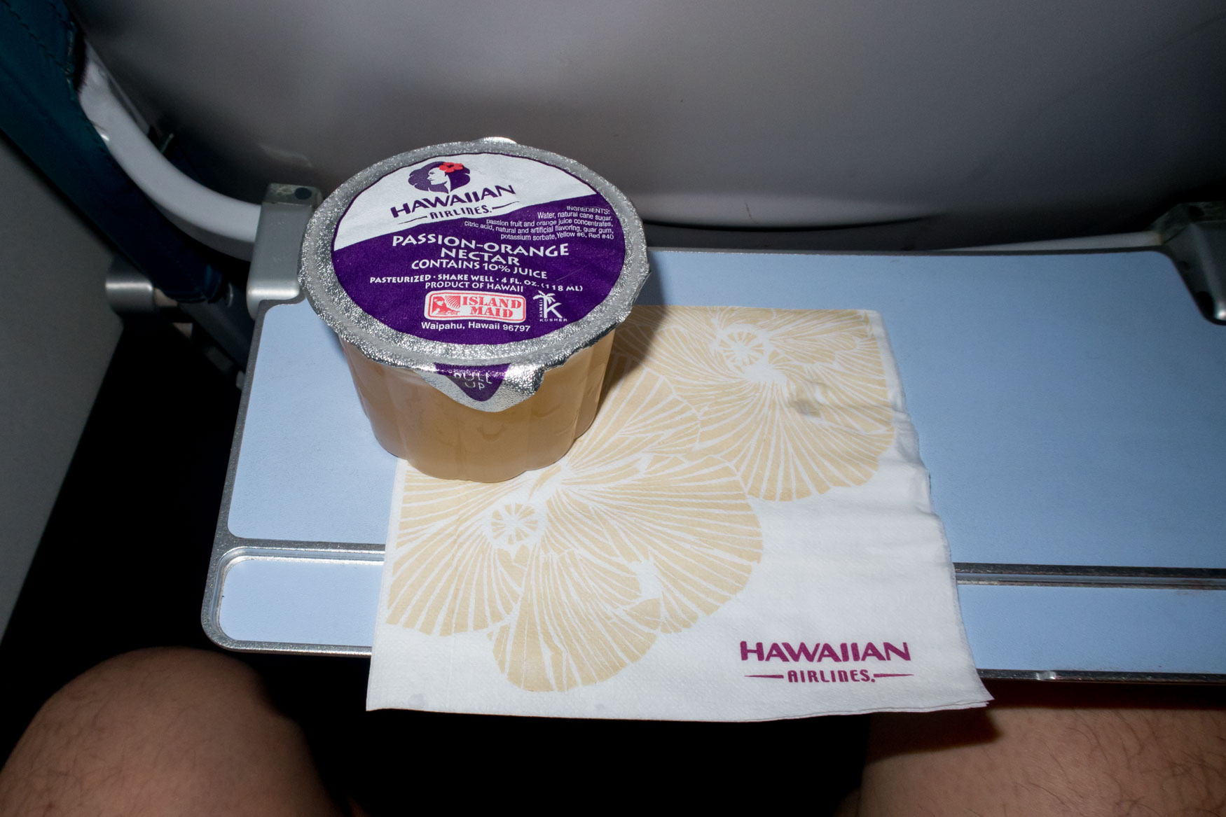 Hawaiian Airlines B717 200 Economy Class Cabin inflight drink services Passion orange nectar