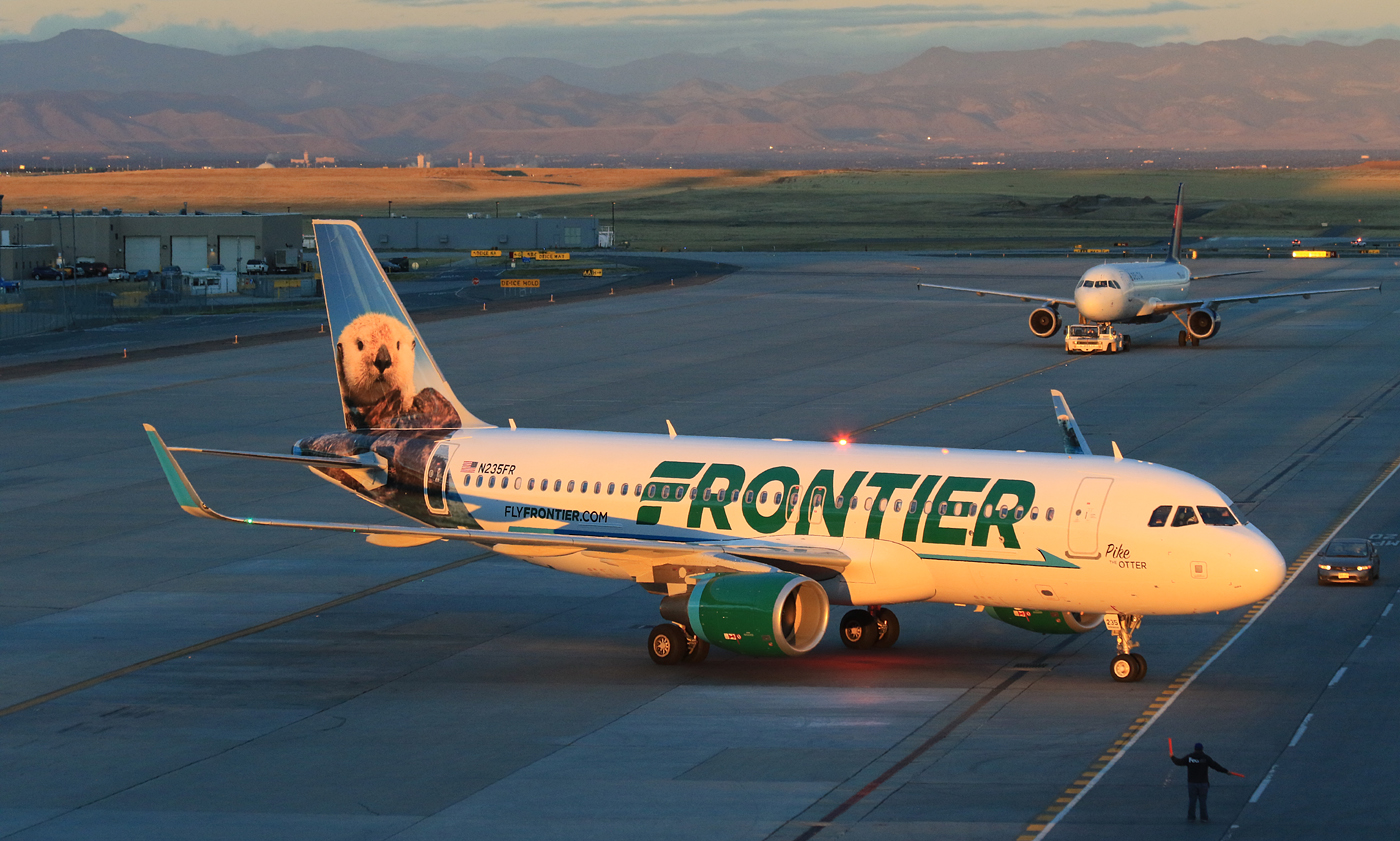 N235FR F WWIG Pike the Otter Airbus A320 214 Frontier Airlines Fleet turning into the gate at Denver International Airport