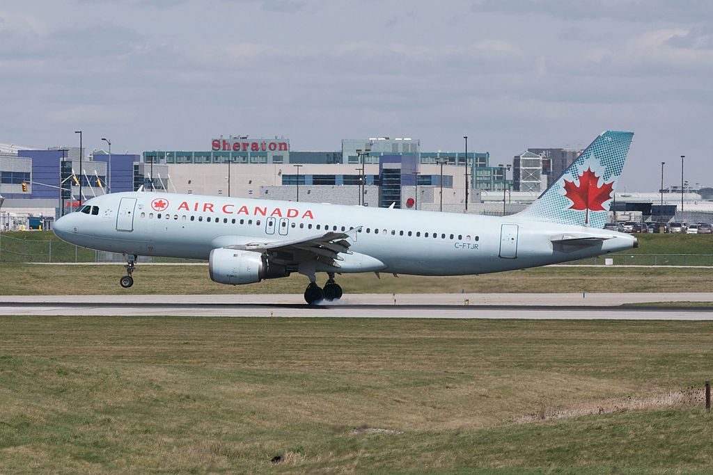 Air Canada Airbus A320 200 C FTJR ties to plant it on a windy day at Toronto Pearson International Airport