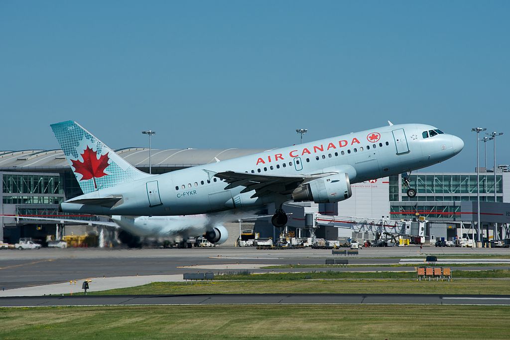 Airbus A319 114 cnserial number 693 Air Canada Fleet C FYKR departing on runway 6L at Toronto Pearson International Airport