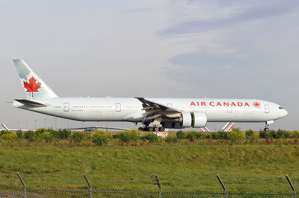 Boeing 777 300ER of Air Canada Fleet C FNNW landing at Paris Charles de Gaulle Airport