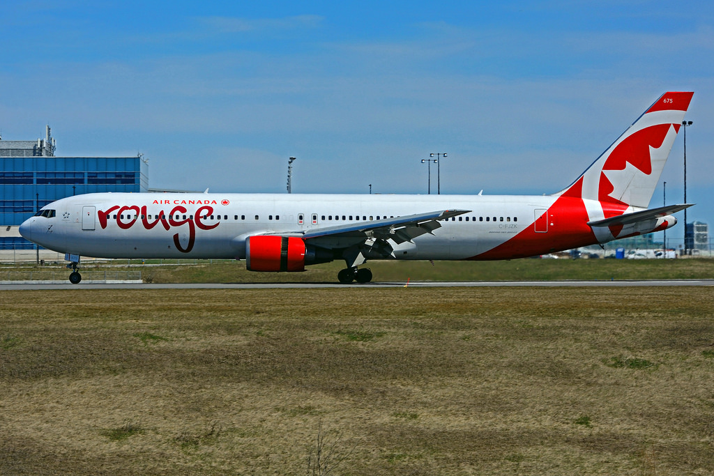 Boeing B767 3Q8ER rouge Air Canada C FJZK leased from AerCap at Toronto Lester B. Pearson Airport YYZ