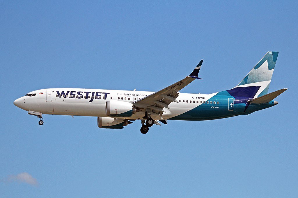 C FNWD Boeing 737 MAX 8 WestJet Airlines on new livery colors approaching Vancouver International Airport YVR