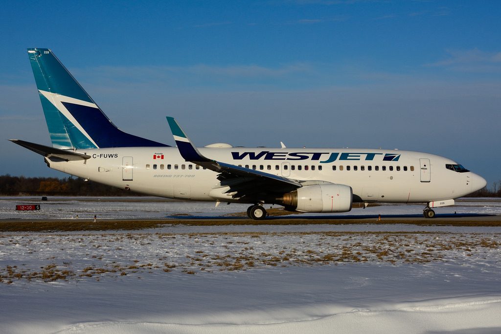 C FUWS Boeing B 737 7CTW WestJet at Hamilton International Airport YHM