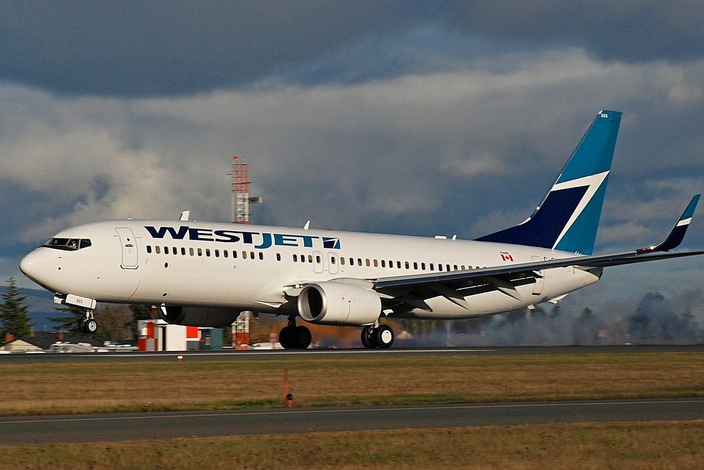 WestJet Airlines Fleet Boeing 737 800 C GVWA landing at Victoria International Airport