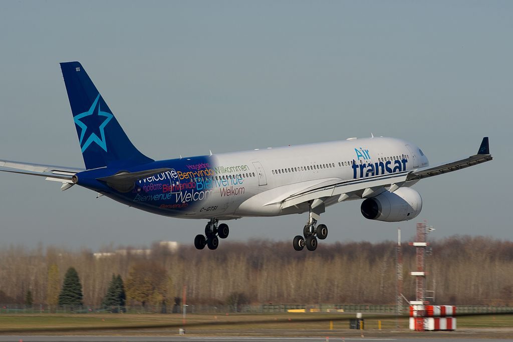 Airbus A330 200 of Air Transat aircraft fleet C GTSI Close final Runway 06L Montréal Trudeau