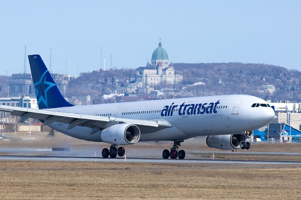 Airbus A330 300 of Air Transat C GCTS landing at Montréal Pierre Elliott Trudeau International Airport