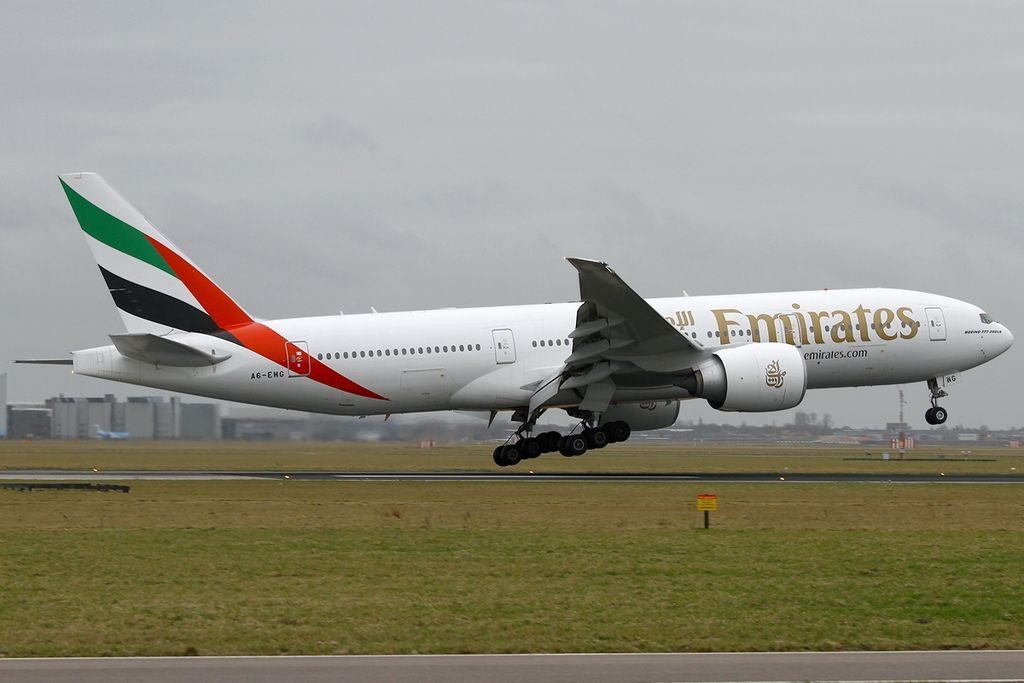 Boeing 777 200LR Emirates Registration A6 EWG landing and takeoff at Amsterdam Schiphol AMS EHAM Netherlands