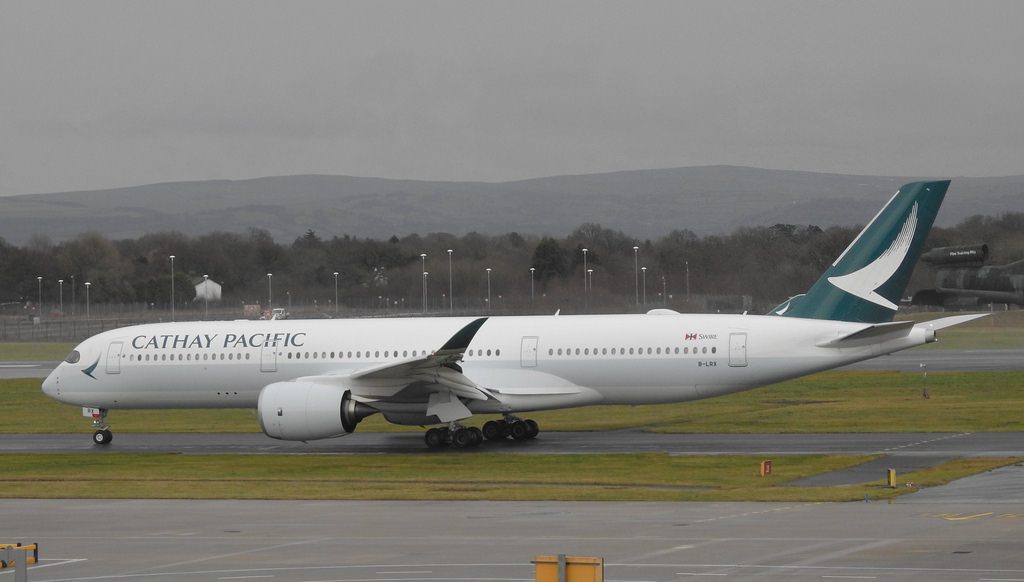 Cathay Pacific Airbus A350 941 B LRX taxiing on runway at Manchester Airport