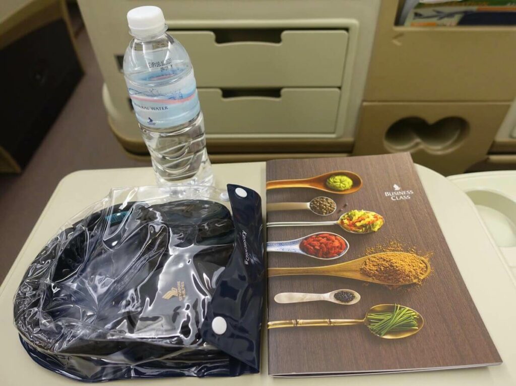 Singapore Airlines Airbus A330 300 business class headphones bottled water and menu